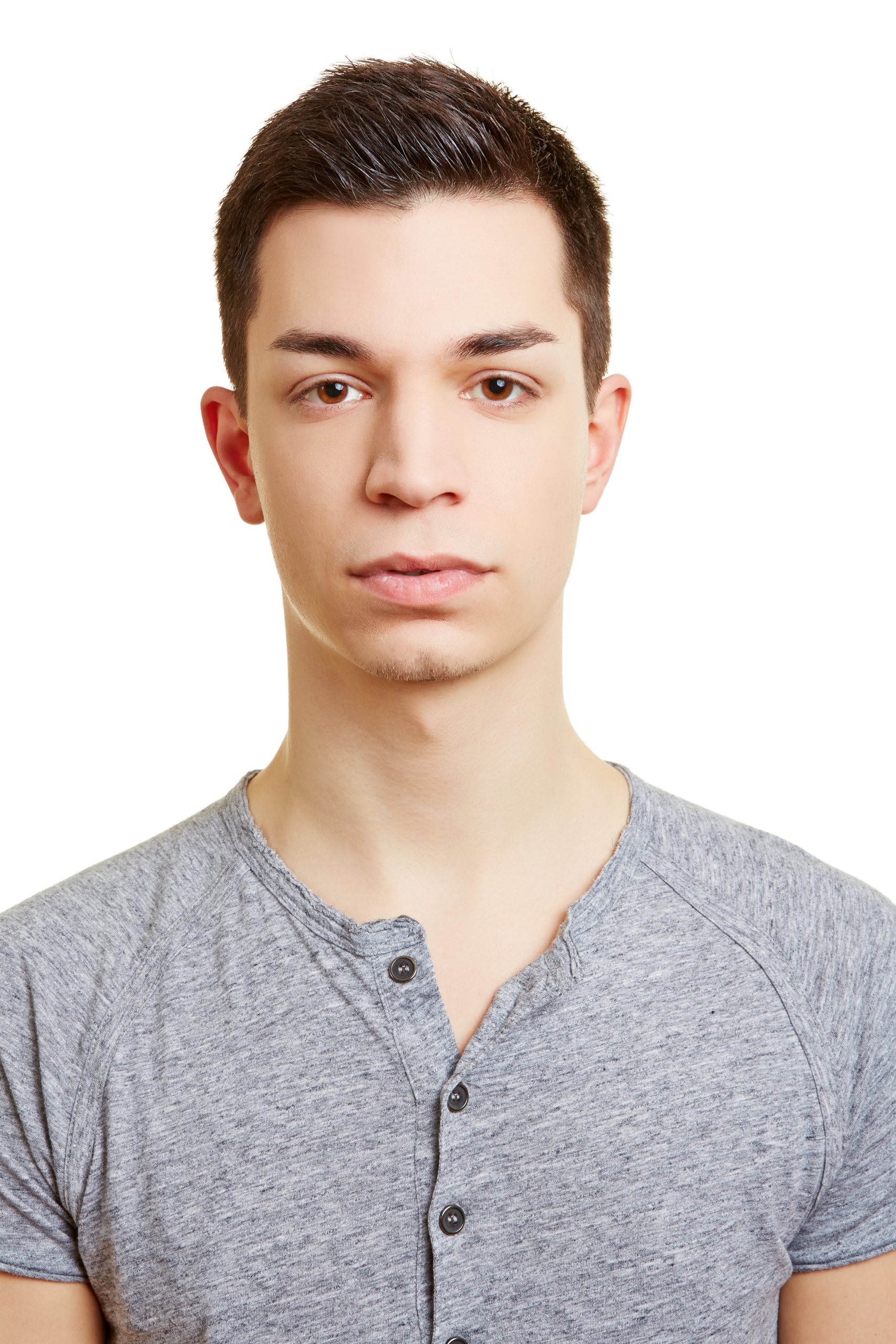 Frontal portrait of a young man Frontal portrait of a young serious man